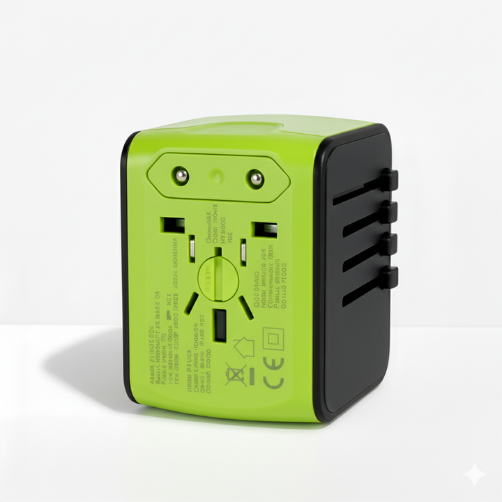 Lime green and black adapter standing on a white surface, showing the plug side with two round pins 9