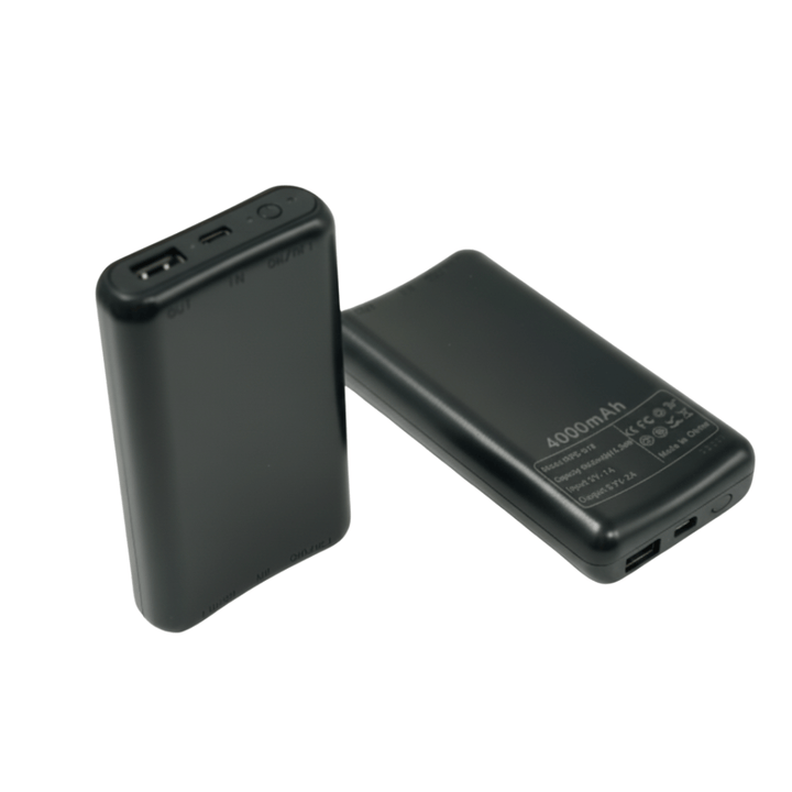 Two black battery packs, one standing to show its USB port and one lying to show its label side 1