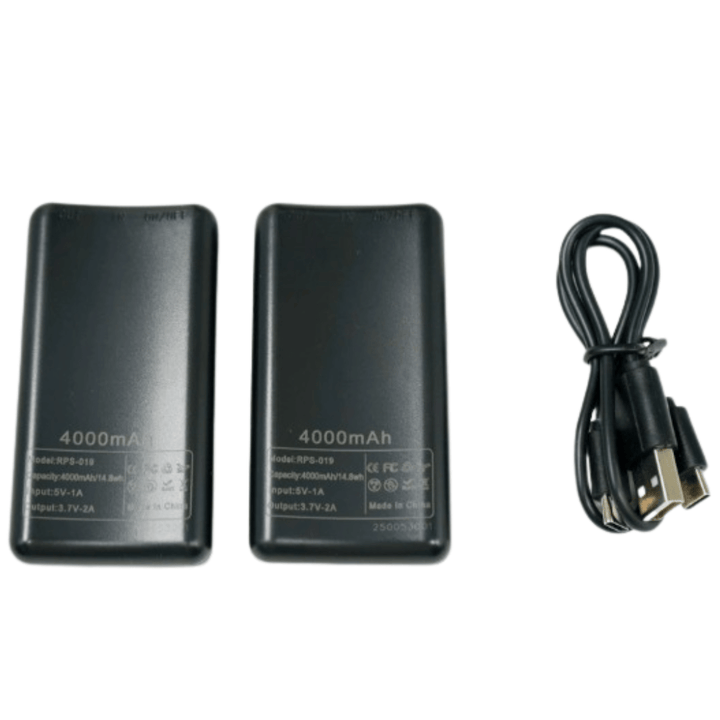 Two black battery packs with rear labels shown, next to a coiled black USB charging cable 9