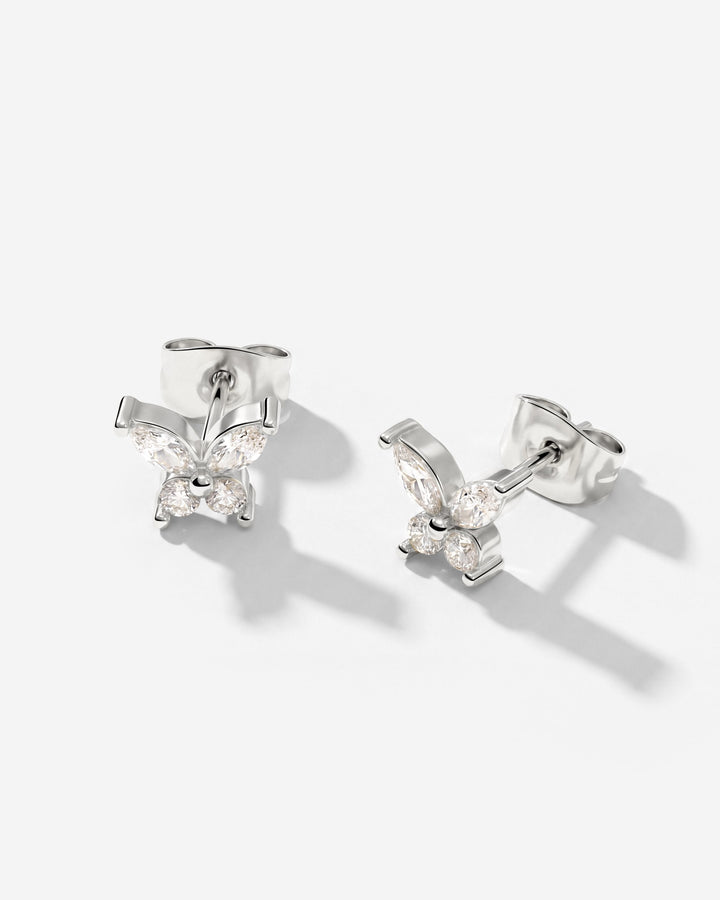 Silver-tone butterfly studs shown at an angle with posts and backs visible, set with clear stones 6