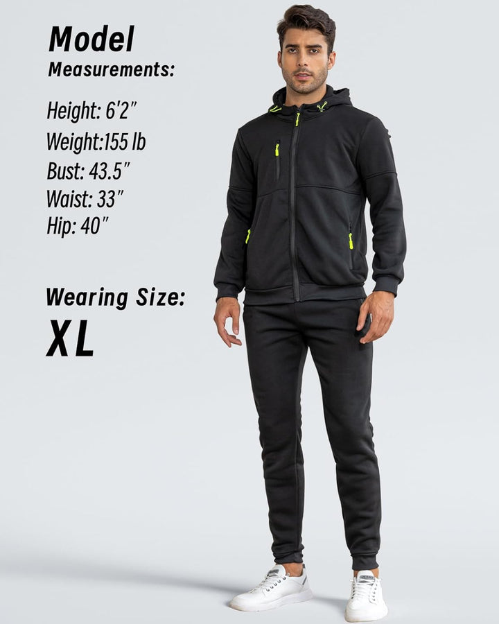 Model in black hooded zip jacket and jogger pants with lime zipper pulls, size XL, measurements listed 21