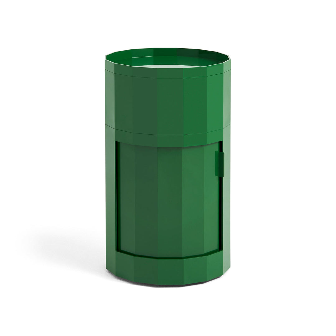 Tall round cabinet in dark green with faceted sides, tray top and closed door 6