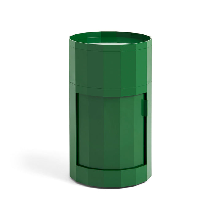 Tall round cabinet in dark green with faceted sides, tray top and closed door 6