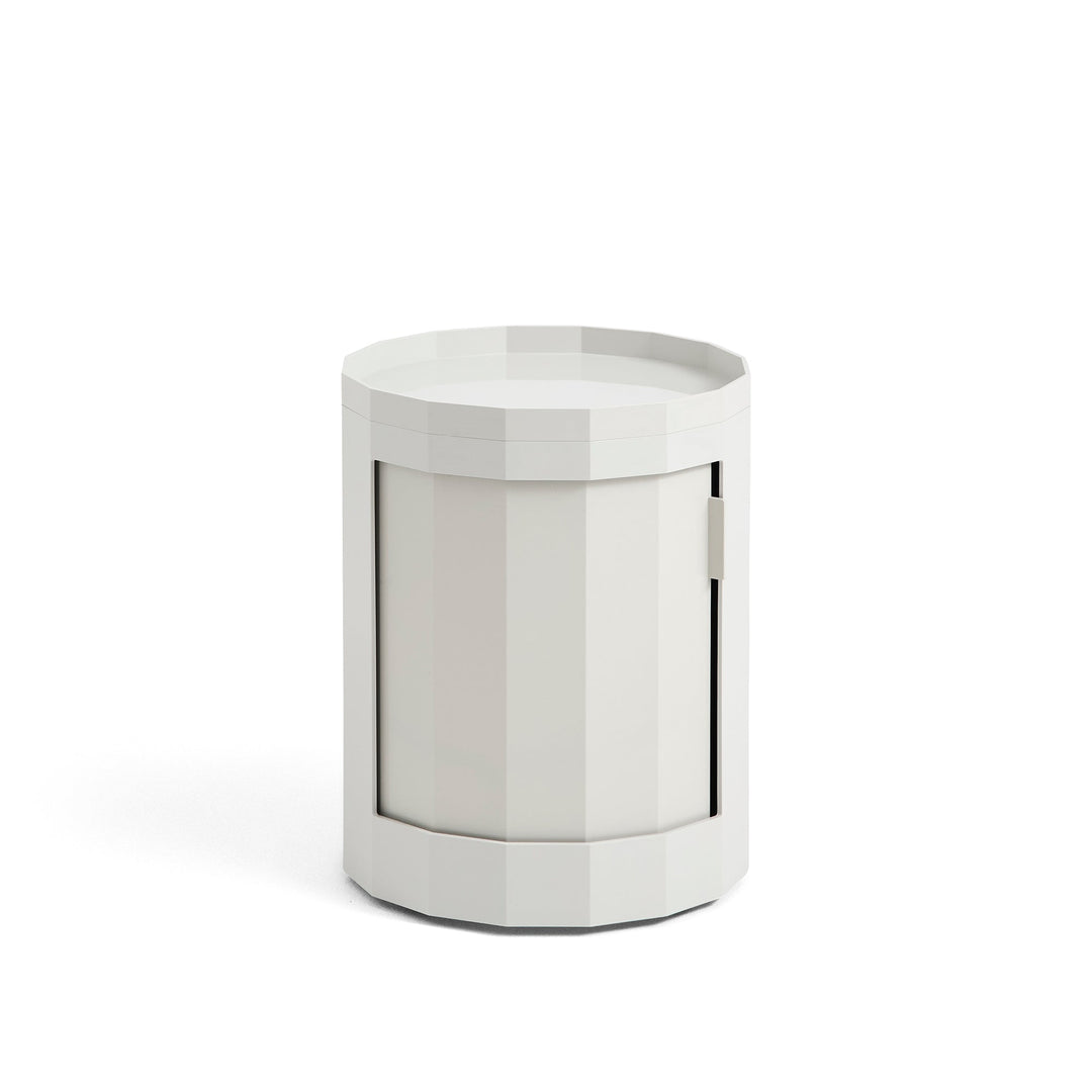 Short round cabinet in light gray with closed door and raised tray top 13