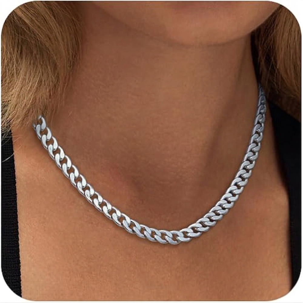Silver-tone chain with flat, polished links worn close to the neck over a black top 3
