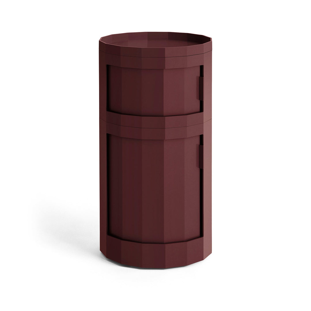 Tall two-door round cabinet in deep burgundy with a faceted body and raised tray top 21