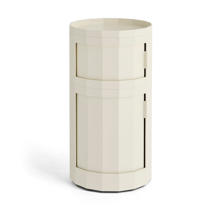 Tall two-door round cabinet in cream with a faceted body and tray top 22