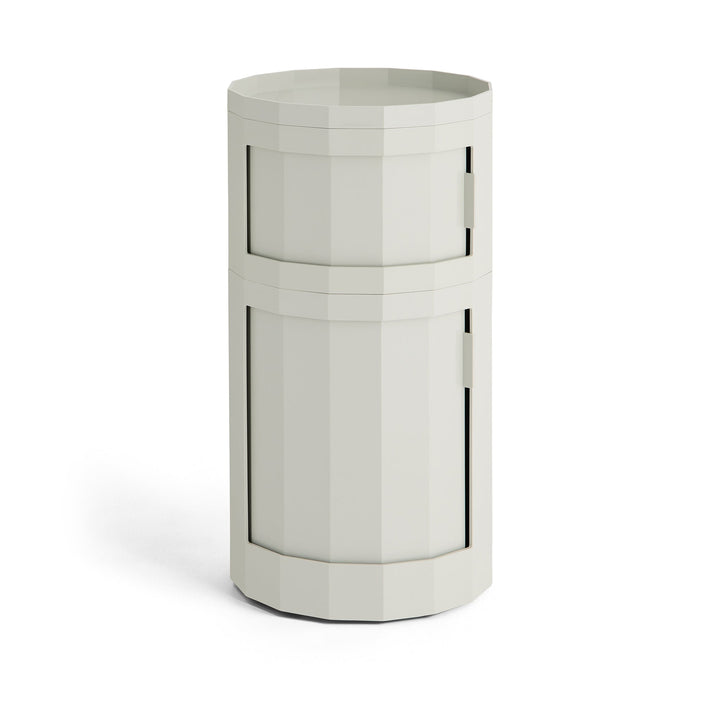 Tall two-door round cabinet in light gray with a faceted body and tray top 24