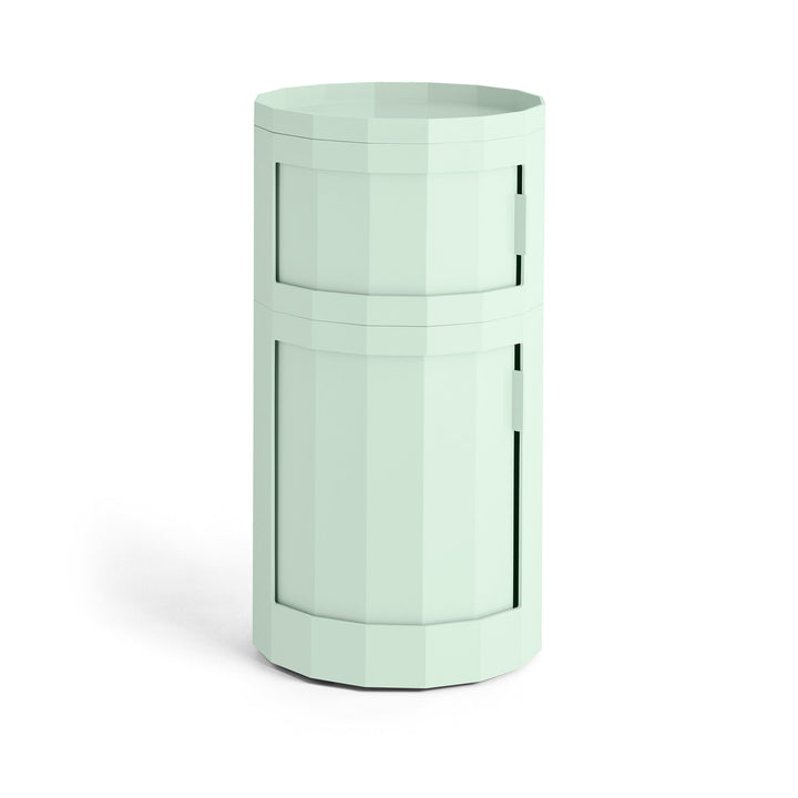 Tall two-door round cabinet in pale mint green with a faceted body and tray top 25