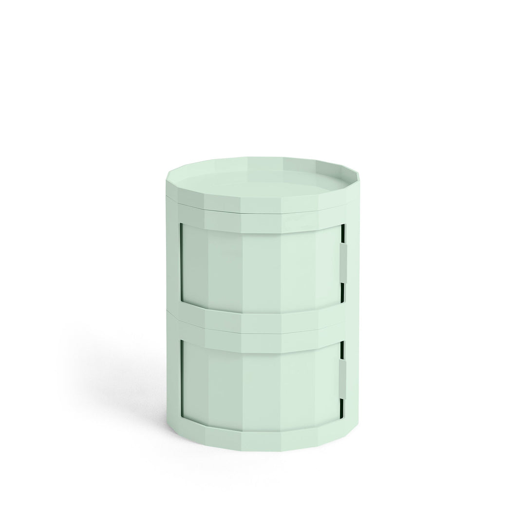 Compact two-door round cabinet in pale mint green with a faceted body and tray top 34
