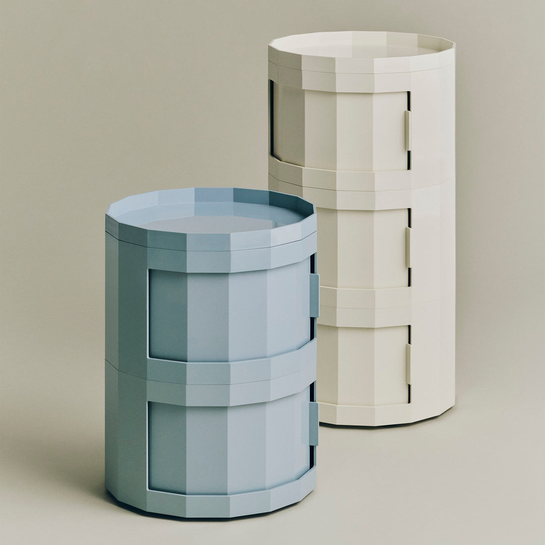 Two-tier light blue cabinet beside a taller three-tier cream cabinet against a beige backdrop 50