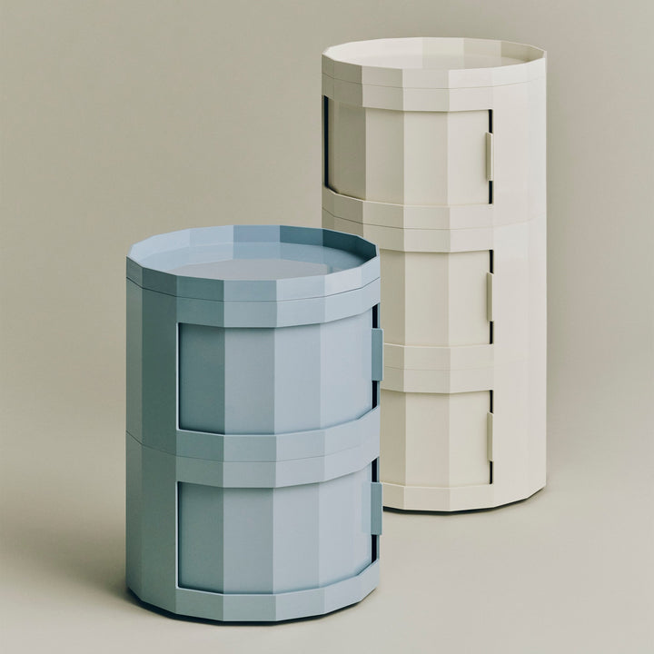 Two-tier light blue cabinet beside a taller three-tier cream cabinet against a beige backdrop 50
