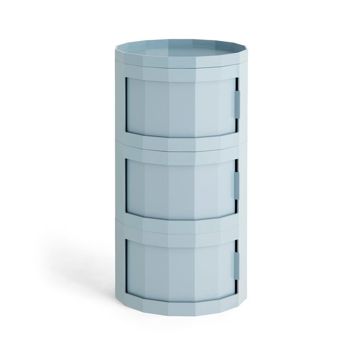 Tall three-door round cabinet in light blue with a faceted body and tray top 40