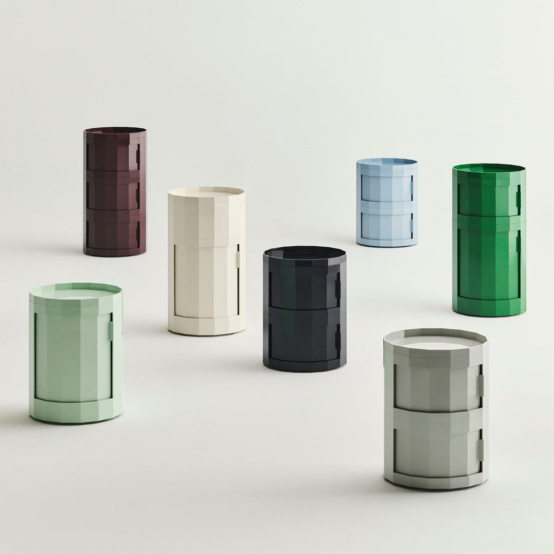 Group of cabinets in burgundy, cream, black, mint, light blue, green and gray in varied heights 54