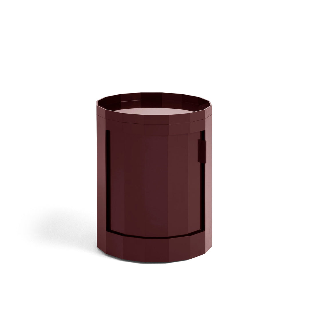 Short round cabinet in deep burgundy with closed door and tray top on white 16