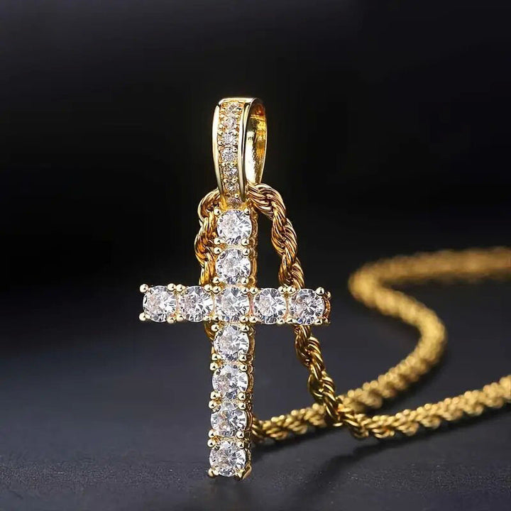 Gold-tone cross pendant set with a row of clear sparkling stones, hanging on a twisted rope chain 1