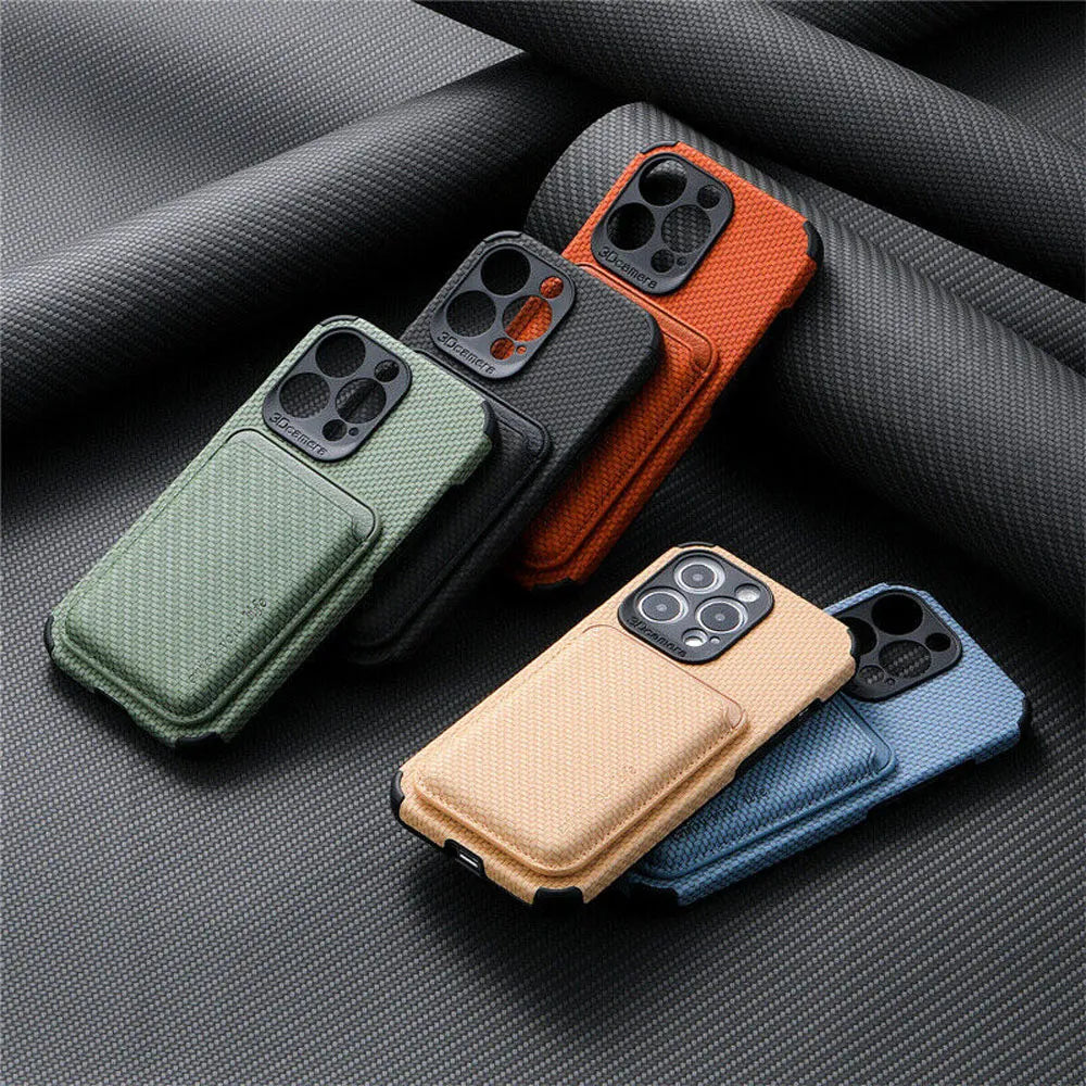 Green, black, orange, tan and blue woven-texture wallet cases scattered across a dark carbon-weave fabric surface 2
