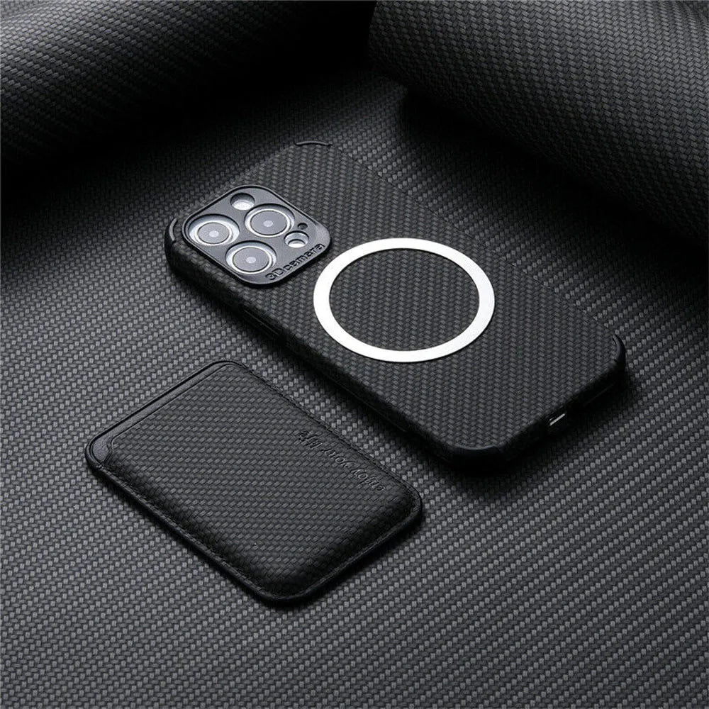 Black carbon-fiber-textured phone case with magnetic ring beside a matching detached card wallet on woven fabric 2