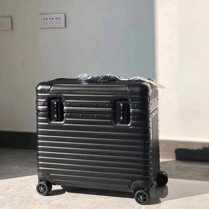 Matte black ribbed hard case with two combination locks, standing on a tiled floor 10