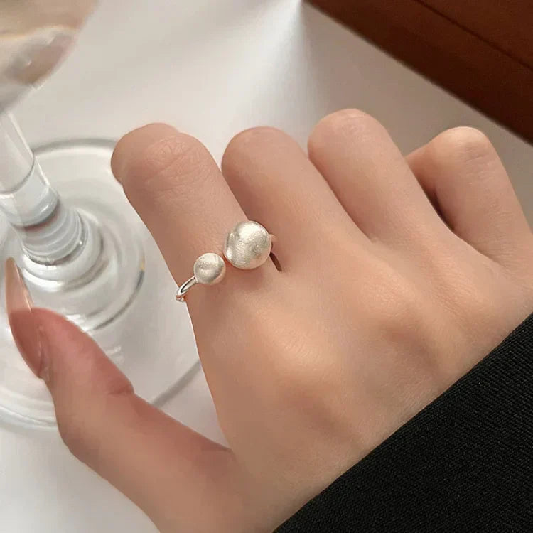 Brushed Silver Ring with Connected Pearls - Elara-Nora Luxe