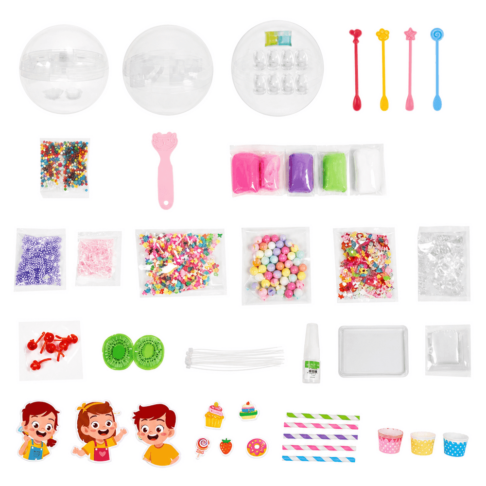 Flat lay on white of clear capsules, colored dough, beads, charms, straws, cupcake cups and kid stickers 2