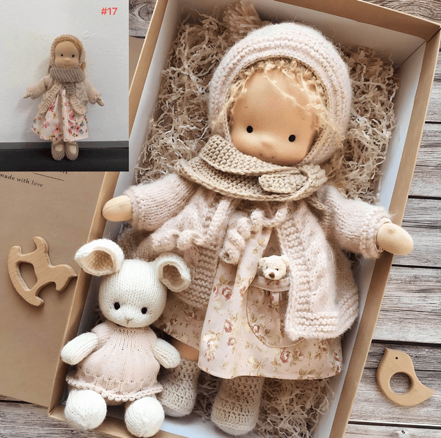 Doll in a pink knit hood, floral dress and cardigan, boxed with a knitted bunny and wooden toys 3