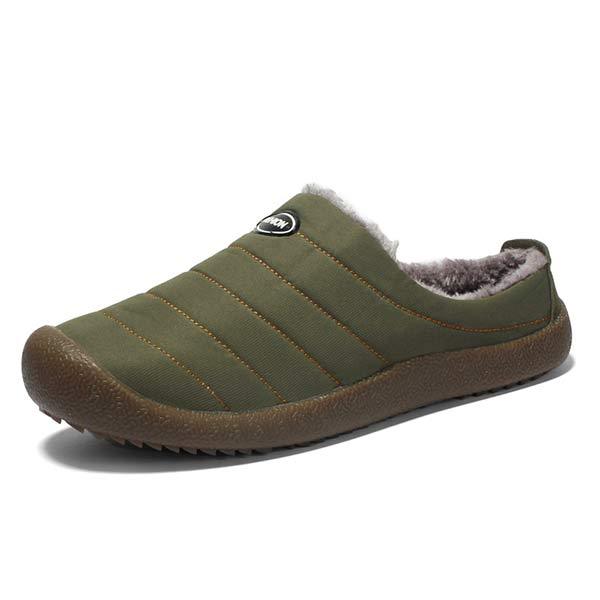 Single olive green quilted slipper with fleece lining, angled view on a white background 14