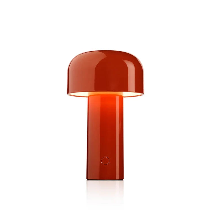 Glossy red lamp with a domed shade and a round touch button on its base, shown alone 3