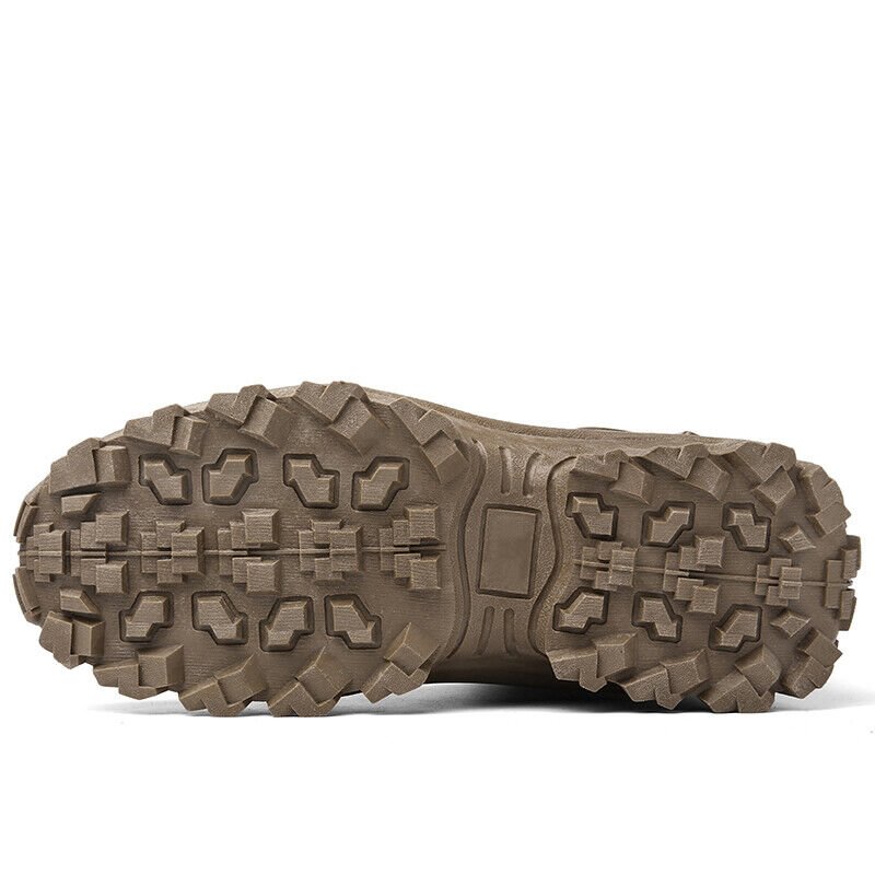 Close-up of a brown boot's outsole, showing the deep blocky tread pattern 18