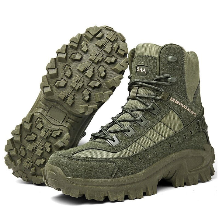 Olive green high-top lace-up boots, one standing and one tilted to show its chunky lugged sole 21