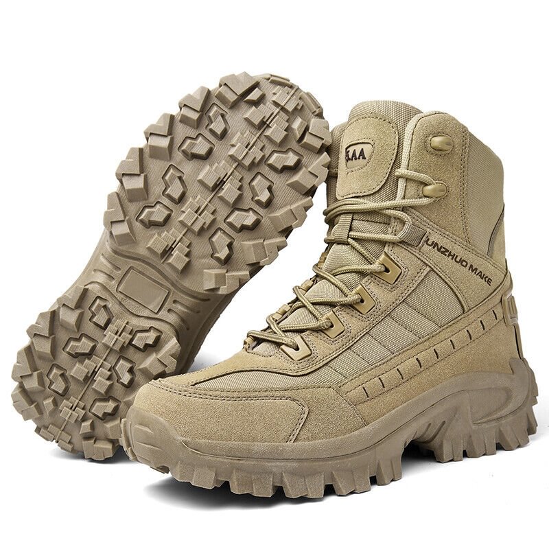 Tan boots on a white background, one tilted to display the deep lugged outsole tread 9
