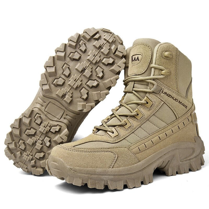 Sand-colored boot beside its upturned mate, showing the chunky tread pattern on the sole 9